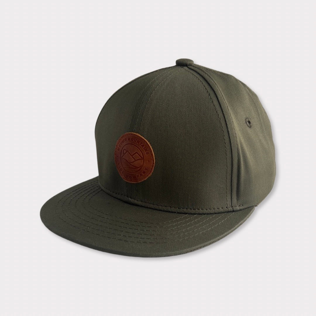 Recycled Collection Earthy Green Kids Flatbill Hat with Leather Patch Angle